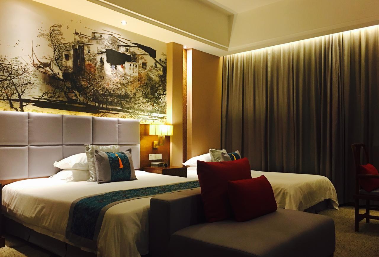 Wu XI Shan Se Hotel Qingyang  Exterior photo